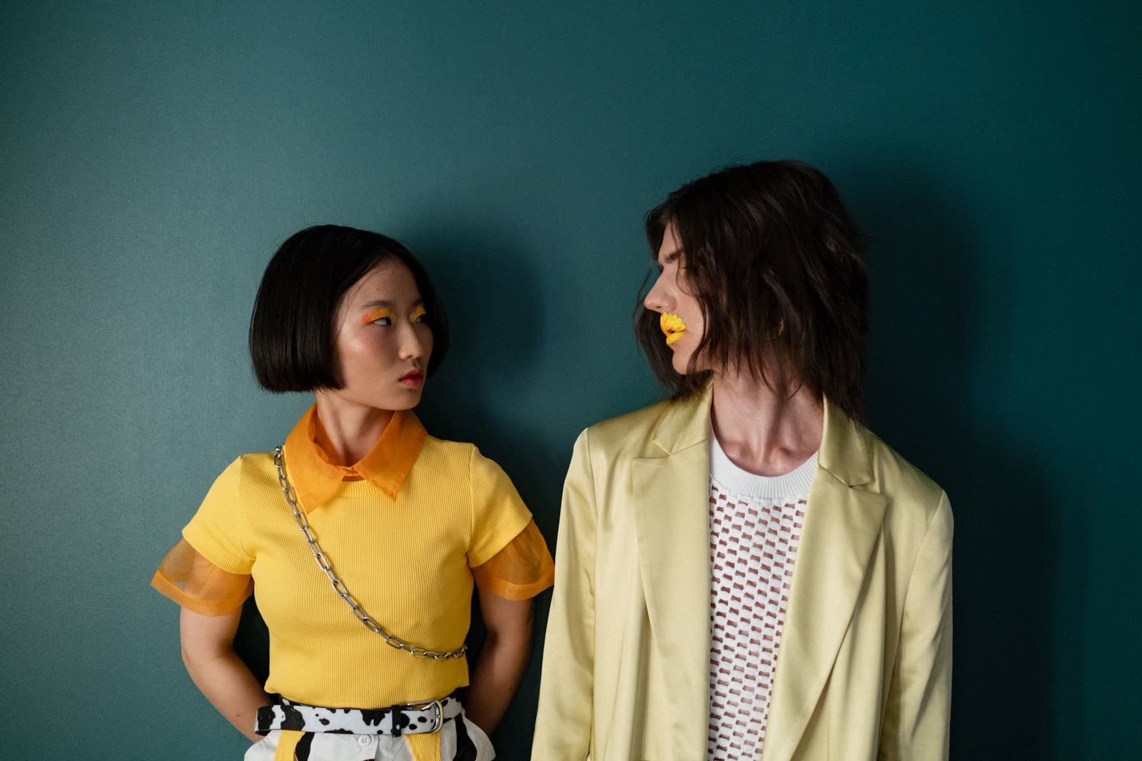 Hand-embroidered cotton blouse with puff sleeves on a hanger